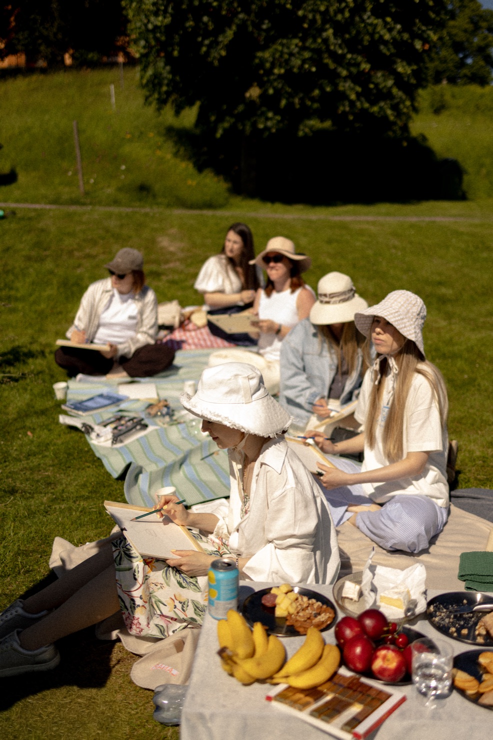 Sketching together on the picnic blanket